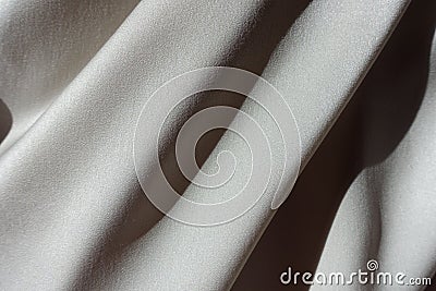 Skew soft folds on grey chiffon fabric Stock Photo