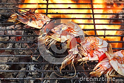 Skewered Big Shrimps On The Hot BBQ Grill Stock Photo