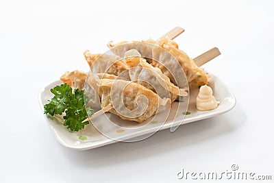 Skewered and Grilled Dumplings Stock Photo