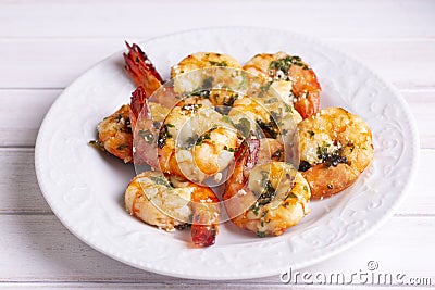 Skewered grilled shrimp with sauce Stock Photo