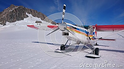 Ski Airplane landing on snow Editorial Stock Photo