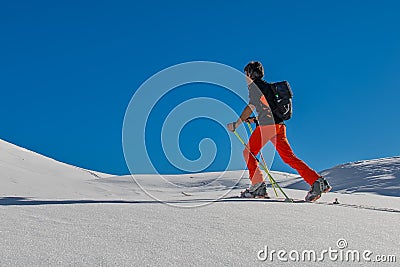 Ski alpinism uphill on the italian alps Stock Photo