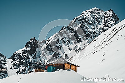 Ski lift in Almaty mountains. Shymbulak Ski Resort Hotel now-capped Tian Shan in Almaty city, Kazakhstan, Central Asia. Stock Photo