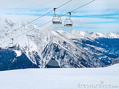 Ski lift in the mountains of Chamonix winter resort, French Alps Stock Photo