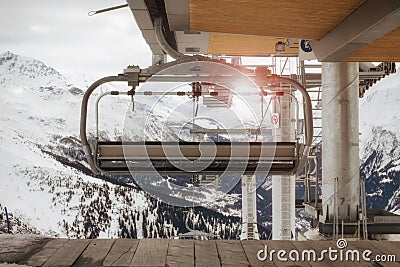 Ski lift and snow in sunlight in winter season, on french alps Stock Photo