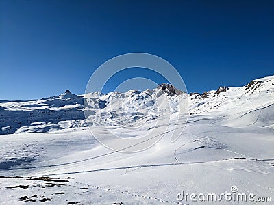 Ski mountaineering in an unbelievably beautiful mountain world. Swiss Alps. Ski touring in winter. Spitzmeilen Glarus Stock Photo