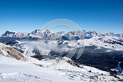 A ski slope above clouds, Alta Badia, Italy Stock Photo