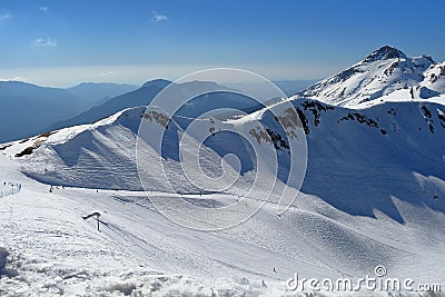 Ski slope in the mountains. Ski resort Rosa Khutor, Russia Stock Photo