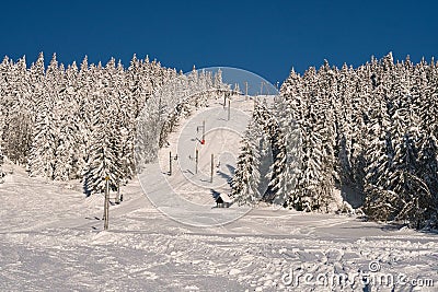 Ski slope with ski lift on ski resort on Kubinska Hola during winter Stock Photo