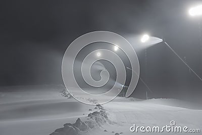 Ski slope with snow guns Stock Photo
