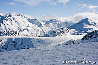 Ski slope in winter mountains Stock Photo