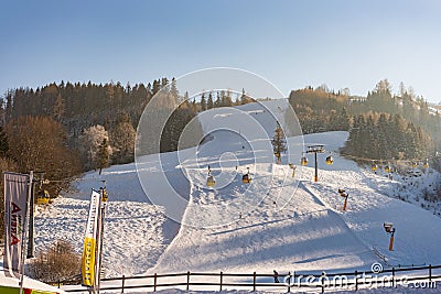Ski station Hauser Kaibling - one of Austria`s top ski resorts: 44 ski lifts, 123 kilometres of ski runs, car park, Schladminger Editorial Stock Photo