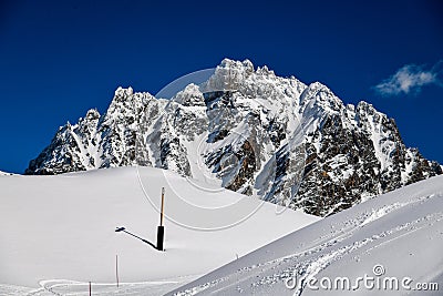 Ski tracks on the fresh snow at the off piste area at the Meribel Ski Resort in France. Stock Photo