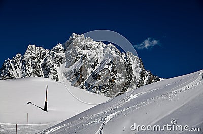 Ski tracks on the fresh snow at the off piste area at the Meribel Ski Resort in France. Stock Photo