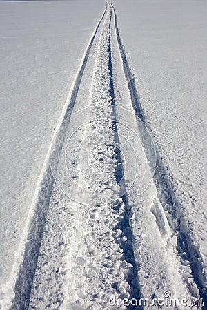 Skidoo track in fresh clean snow Stock Photo