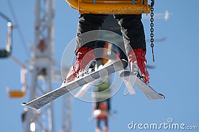 Skier on chair lift Stock Photo