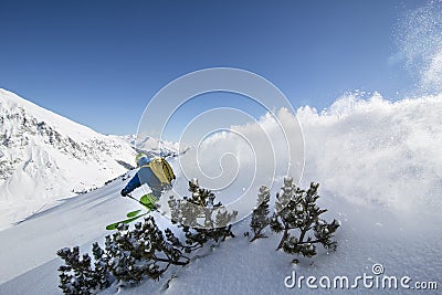 Skier in deep powder, extreme freeride - austria. Editorial Stock Photo
