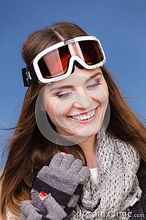 Skier girl wearing warm clothes ski googles portrait. Stock Photo