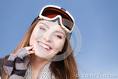 Skier girl wearing warm clothes ski googles portrait. Stock Photo