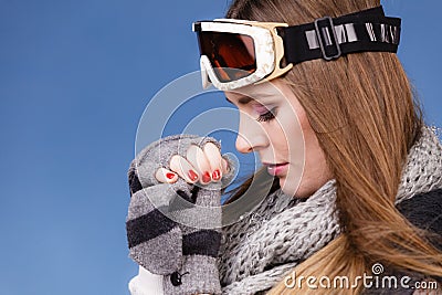 Skier girl wearing warm clothes ski googles portrait. Stock Photo