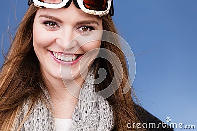 Skier girl wearing warm clothes ski googles portrait. Stock Photo