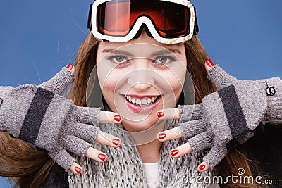 Skier girl wearing warm clothes ski googles portrait. Stock Photo