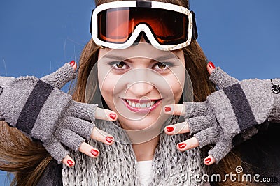 Skier girl wearing warm clothes ski googles portrait. Stock Photo