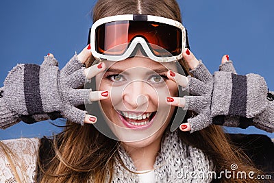 Skier girl wearing warm clothes ski googles portrait. Stock Photo