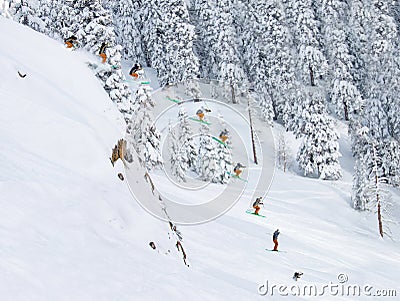 Skier jumping off cliff Stock Photo