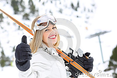 Skier ready to sky looking at camera with thumb up Stock Photo