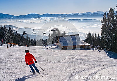 A skier on ski slope on Kubinska Hola ski restort during winter Stock Photo