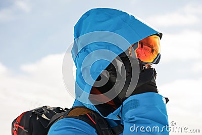 Skier talking on mobile phone Stock Photo
