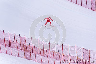 Skier trying to slow down at the bottom of the steep slope at Velocity Challenge and FIS Speed Ski World Cup Race at Sun Peaks Editorial Stock Photo