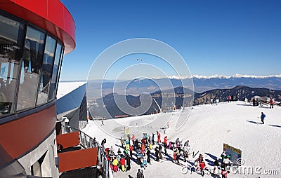 Skiers on the cable car station Chopok Editorial Stock Photo