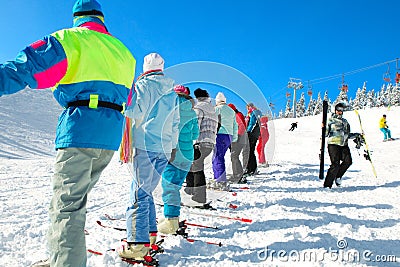 Skiers come upstairs Stock Photo