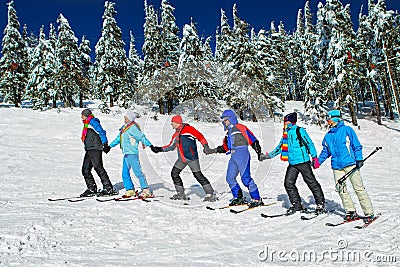 Skiers come upstairs Stock Photo