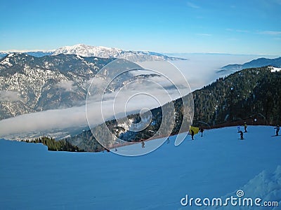 Skiers in high mountains Stock Photo