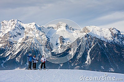 Skiers mountains in the background Stock Photo
