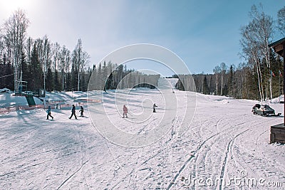 Skiers ride from the mountain. Ski resort. Winter in Siberia. Winter landscape. Beautiful nature Editorial Stock Photo