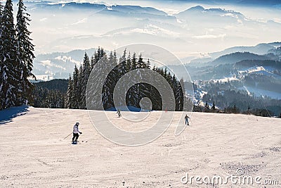 Skiers on ski resort on Kubinska Hola ski restort during winter Stock Photo