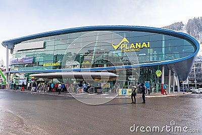 Skiers and tourists in front of ski cable car station Planai Schladming. Schladming, Steiermark, Austria Editorial Stock Photo