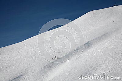 Skiers on wide track Stock Photo