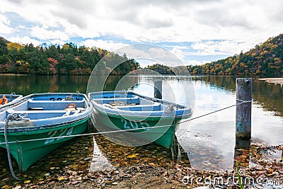 Skiff boats, lake and blue sky nature Stock Photo