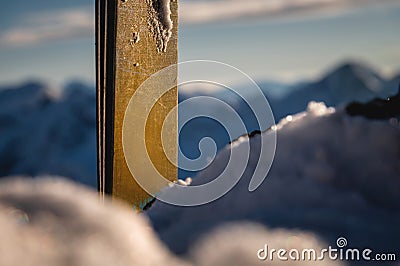 Skiing. Close-up of the top of the skis, snow is falling, with snow-capped mountains in the background. ski resort Stock Photo