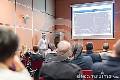 Skiled Public Speaker Giving a Talk at Business Meeting. Editorial Stock Photo