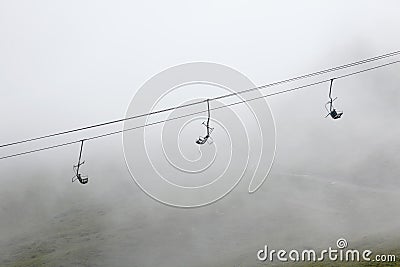Skilift in fog Stock Photo