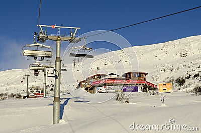 Skilifts and skiers restaurant Editorial Stock Photo