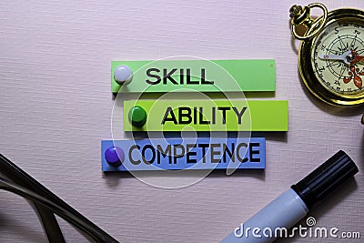 Skill, Ability, Competence text on sticky notes isolated on office desk Stock Photo