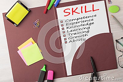 SKILL written on vertical sheet Stock Photo