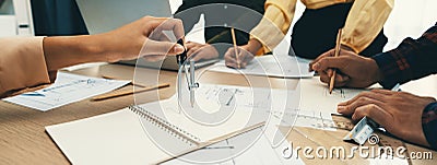 Skilled architect using architectural equipment during meeting. Delineation. Stock Photo